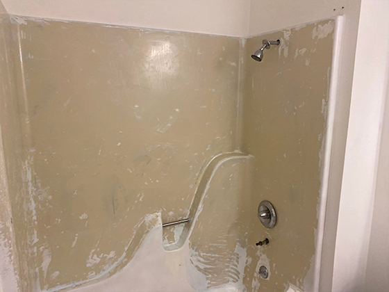 Unsightly, Worn Tub and Shower